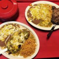 Si Senor Steak · 8oz Handcut Ribeye Steak cooked well done served with two cheese enchiladas on the side. Gua...