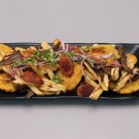 Picadera · Serves 2. Grilled chicken, sausage, bistec, fries, tostones. Topped with cured onions and to...