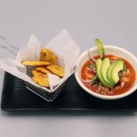 Ceviche · Served with tostones.