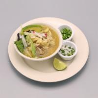 Pozole · Traditional Mexican Soup. It  is made from hominy with pork seasoned and garnished with lett...