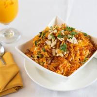 Vegetable Biryani · Specially cooked basmati rice embedded with a rich mix of vegetable curry garnished with lem...
