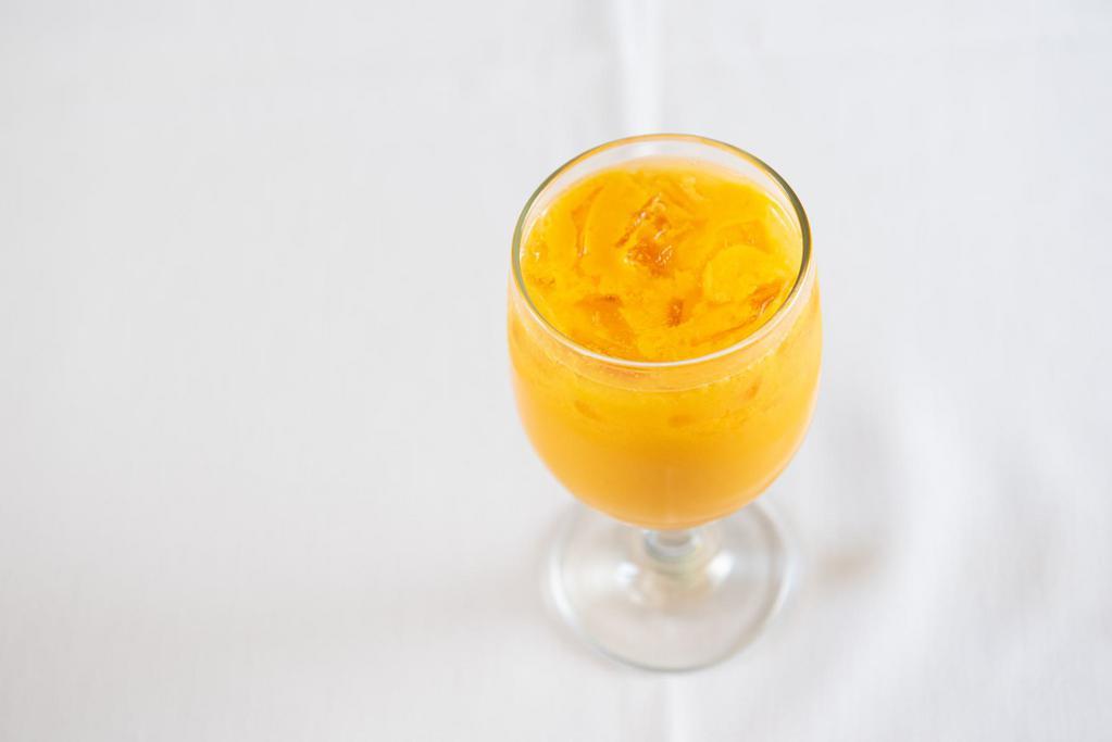 Mango Lassi · Mango flavored yogurt drink.