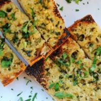 Old School Garlic Bread · Rustic bread, parsley butter.