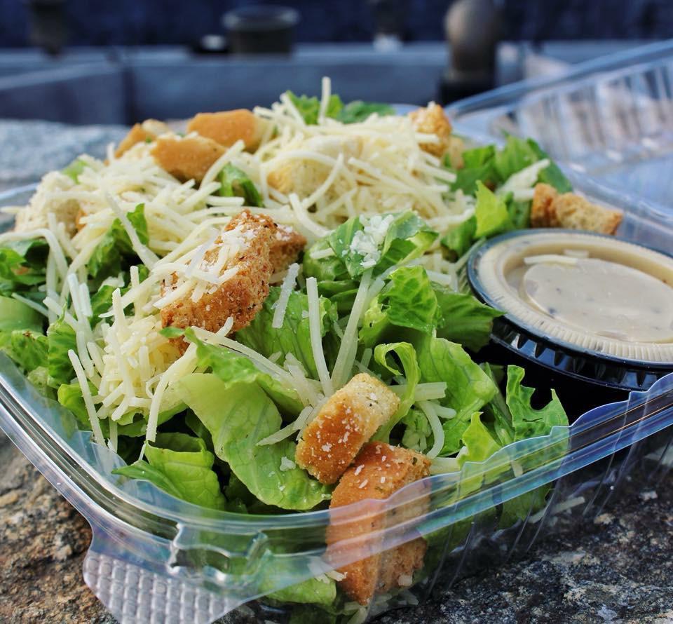 Caesar Salad  · Croutons and shaved Parmigiano.