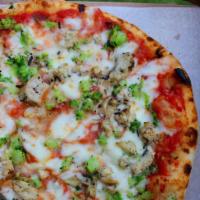 Chicken & Broccoli Pizza · Grilled chicken, roasted broccoli, garlic, parmigiano, tomato sauce, mozzarella.