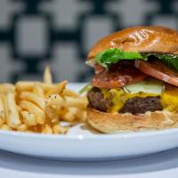 the Burger · 8oz beef blend, cheddar, balsamic shallots, specials sauce, brioche bun served with fries (c...