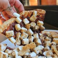 S'mores Pizza · Nutella, toasted marshmallow and graham cracker crumbs.