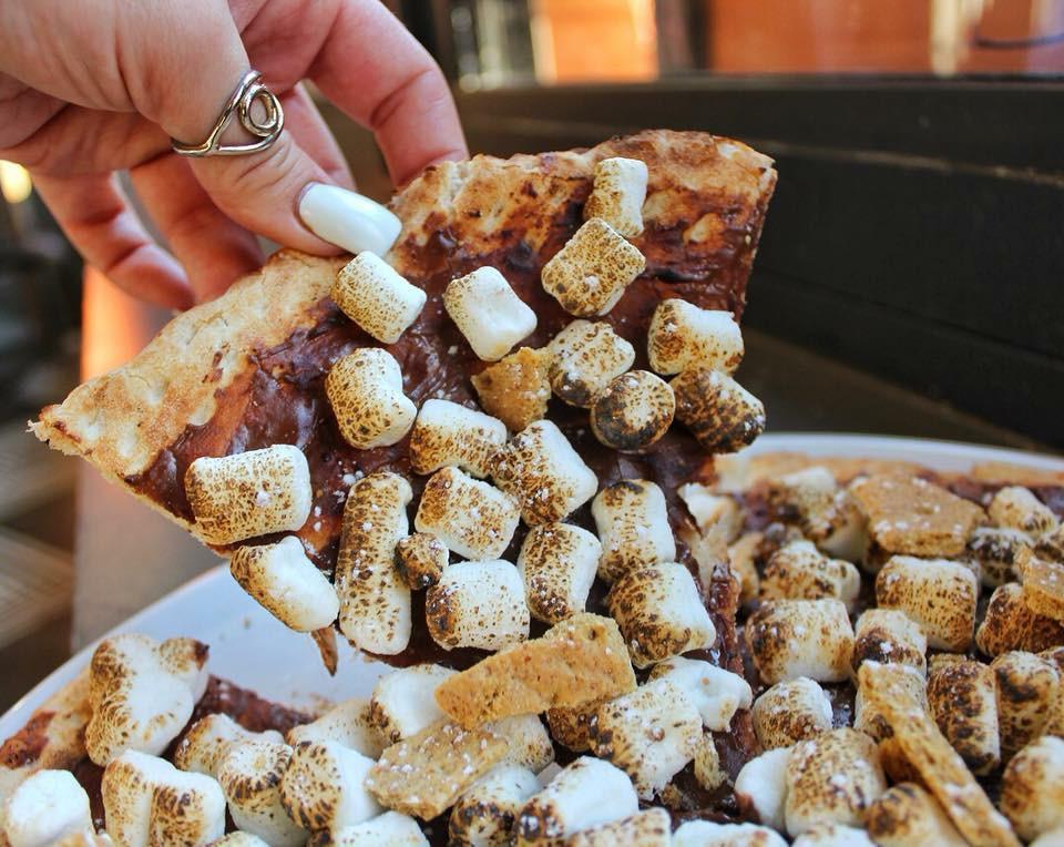 S'mores Pizza · Nutella, toasted marshmallow and graham cracker crumbs.