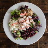 Dr. Beeks Salad · Field greens, cranraisins, feta, candied walnuts and raspberry vinaigrette.
