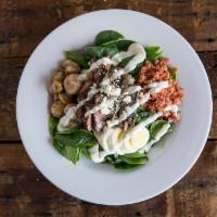 Dr. Detroit Salad · Baby spinach, roasted button mushrooms, bacon, sliced egg and chunky bleu cheese dressing.