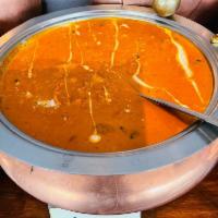 Chicken Makhani · Dark meat tandoori chicken with creamy tomato sauce, exotic herbs and spices.