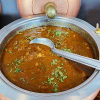 Goat Curry Leaf · A traditional mildly spiced Indian curry with tender pieces of goat (hot).
