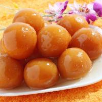 Gulab Jamun · Milk balls dipped in sugar and honey syrup.

