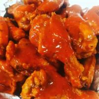 40 Wings · Our Jumbo sized seasoned chicken wings are fried the tossed in your choice of sauce