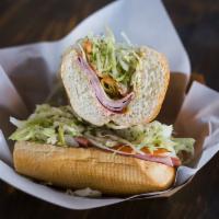 Torpedo · Salami, mortadella, ham, provolone, mustard, mayo, lettuce, tomatoes, onion, pepperoncini wi...