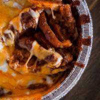 Chili Cheese Fries · Fries with chili and melted cheese
