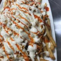Buffalo Chicken Fries · Fries with chicken breast tossed with buffalo sauce, melted cheese and drizzled with blue ch...