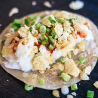 Mashed Potato Taco · sour cream | sam's hot sauce | green onion | crushed potato chips