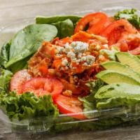 Buffalo Chicken Salad · Mixed greens, sliced chicken breast tossed with spicy wing sauce, crumbled bleu cheese, baco...