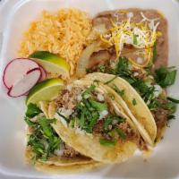 Taco Plate · 3 tacos with your choice of meat. Topped with cilantro, raw onions, and radish. Served with ...