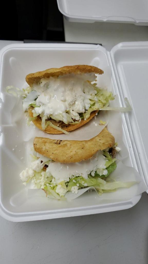Gorditas de Picadillo · Lightly fried homemade gordita filled with ground beef picadillo, shredded lettuce, crumbled queso fresco, and sour cream. Served with a side of our special tetillas salsa.
