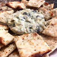Spinach & Artichoke · Creamy spinach and artichoke dip served with crispy bianco pizza thins.