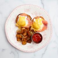 Eggs Benedict Brunch · Toasted English muffins topped with organic poached eggs, Canadian bacon and hollandaise sau...