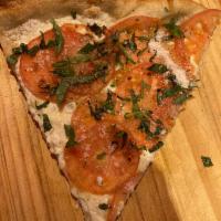Caprese Pizza · Fresh mozzarella, Sliced tomato, basil, pecorino cheese, extra virgin olive oil.