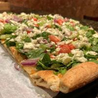 Salad Pizza · Romanie Lettuce, Cucumbers, Tomato, Red Onion, Feta Cheese on a crispy crust.