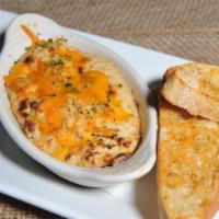 Fiesta Crab Dip · Maryland crab dip with a kick. Crab, shrimp, cream cheese, pico and spices baked till hot. S...