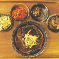 Bulgogi Japchae  · L Pan fried glass noodles with assorted vegetables beef in house sauce.