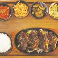 Korean Short Ribs · 24-hour-eged and marinated beef short ribs in house soy sauce.