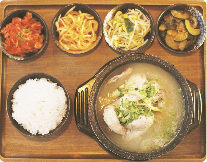 Samgye Tang · Korean traditional chicken soup for body health consists of garlic, rice, jujube and ginseng.