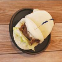 Steamed Bun · Steamed soft buns with lettuce and pickled radish.