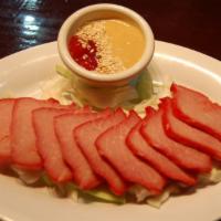 BBQ Pork · Thick slices of pork served with ketchup and chinese hot mustard.