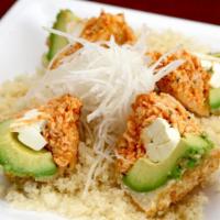 Monkey Brain · A deep fried avocado filled with spicy tuna, crab meat and cream cheese.