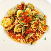 Linguini Vongole Dinner · Littleneck clams sauteed with fresh basil in garlic and extra virgin olive oil or marinara s...