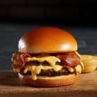 NEW! Bacon Cheddar Cheesy Burger · The Bacon Cheddar Cheesy Burger. The burger features ½ lb of fresh Angus beef, Applewood smo...