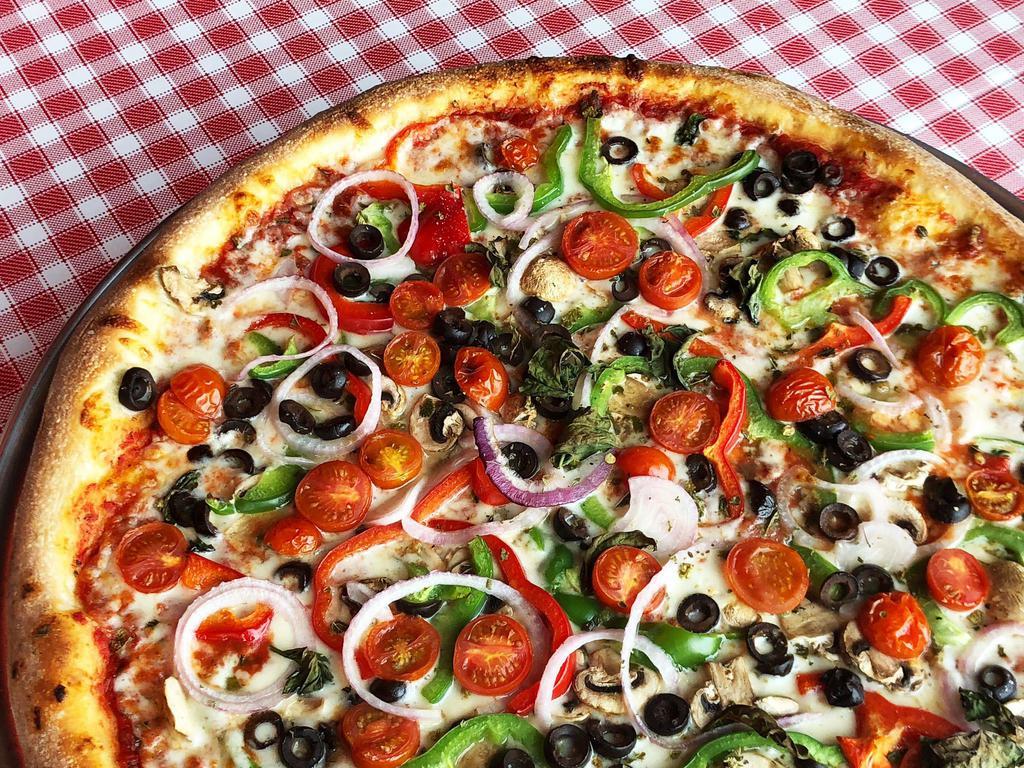 Veggie Veggie Pizza · Mushrooms, black olives, red onion, green peppers, basil, fresh cherry tomato, mozzarella cheese, and red sauce.