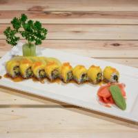 Golden Dragon Roll  · Includes eel, avocado, topped with fresh mango, eel sauce, and fish egg.