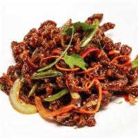 Szechuan Crispy Beef · Fried shredded beef, onions, carrots and snap peas in a sweet spicy sauce. Spicy.