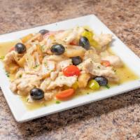Chicken Palermo · Sauteed in a white wine and butter sauce with pepperoncini, olives, potatoes, tomatoes, and ...