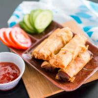   Egg Rolls with Cucumber Slices 素炸春卷伴青瓜 · Crispy dough filled with minced vegetables.