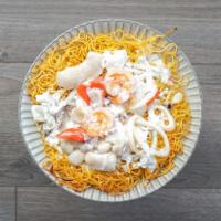 Mixed Seafood in Egg Gravy 海鮮滑蛋煎麵 · Crispy noodles.
