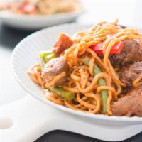 Thick Noodles with Red Curry Beef Brisket 紅咖喱牛腩濕炒粗麵 · Beef.