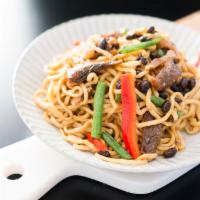 Stir Fried Noodles with Black Soybean Fish 豆豉鯪魚炒粗麵 · Noodle dish made from rice flour and water.