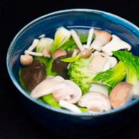 Assorted Vegetable Mushroom Tofu Soup 大佛寺素菜珍菌豆腐湯 · Soup made from bean curd.