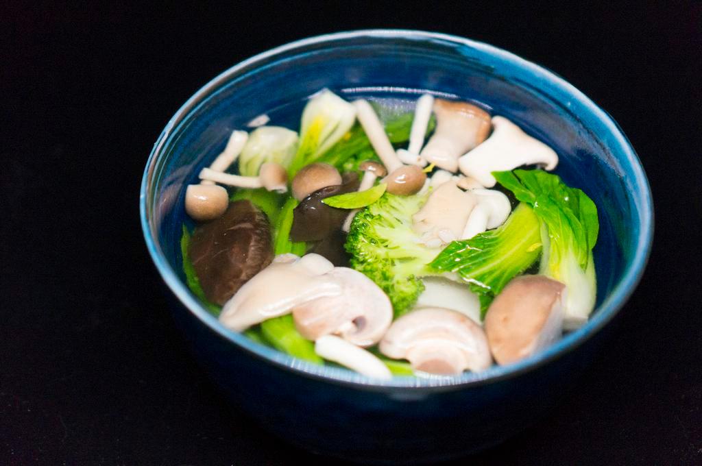 Assorted Vegetable Mushroom Tofu Soup 大佛寺素菜珍菌豆腐湯 · Soup made from bean curd.