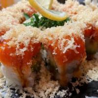 20. Volcano Roll  · White tuna, avocado inside, with spicy tuna and crunchy on top.