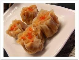 D2. Sticky Rice Shumai · 4 pieces, sticky rice vegetable ham, shitake mushrooms, steamed in wonton wrappers. Vegan.